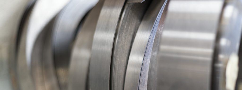 Spring steel strip in sheet and coil